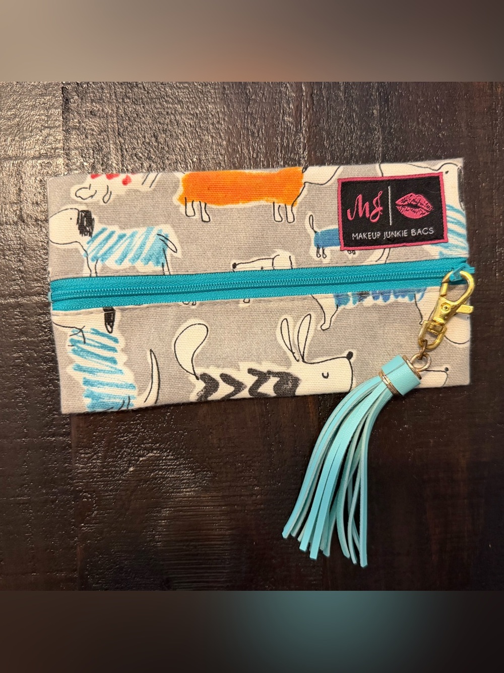 Makeup Junkie - Mini Turquoise Tassel Zip Pouch